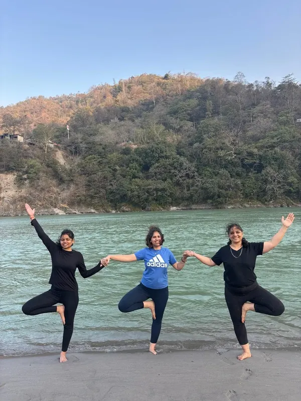 Joyful Group Asana Practice overlooking Rishikesh Hills